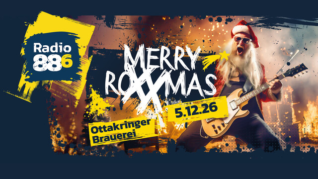 Ein Weihnachtsmann mit E-Gitarre vor Funken und Flammen