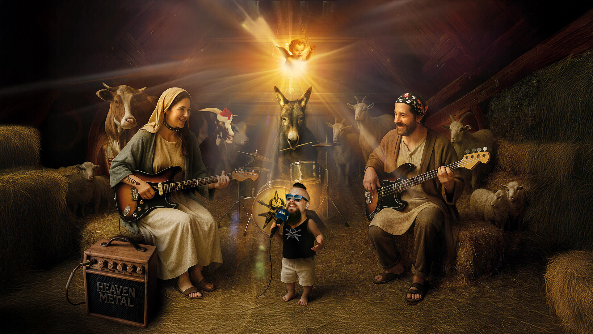 Das Bild zeigt eine rockige Weihnachtskrippe, in der Maria, Josef und das Jesuskind als Metal-Band auftreten.