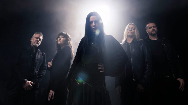 Evanescence in a dark room with a bright light in the background